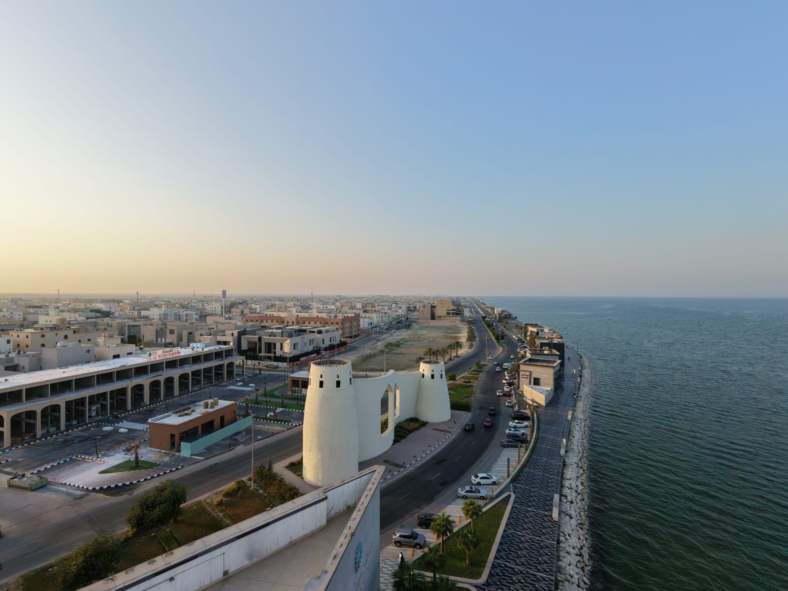 Aerial drone photo of Qatif Corniche and its heritage-style gate, Eastern Province, Saudi Arabia